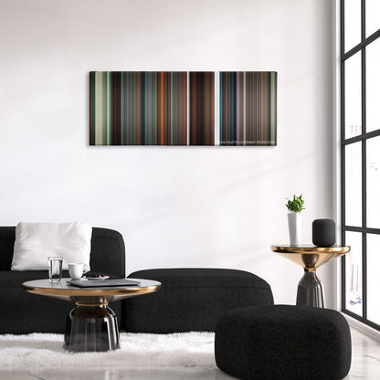 Alice in Wonderland color palette canvas above a black sofa with a gold-topped table