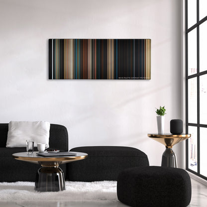 I Am Number Four color palette canvas above a black sofa with a gold-topped table