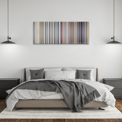Love Actually color palette canvas above a bed, between two black pendant lamps