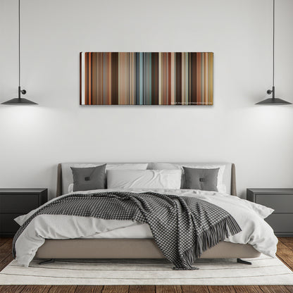 Juno color palette canvas above a bed, between two black pendant lamps