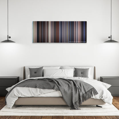 Flight of the Navigator color palette canvas above a bed, between two black pendant lamps