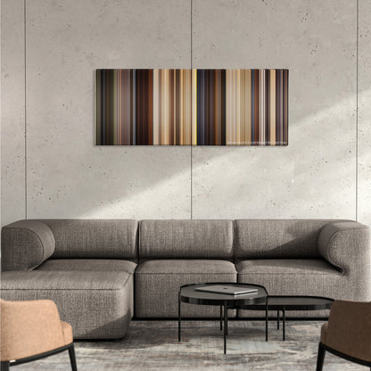 Indiana Jones and the Raiders of the Lost Ark color palette canvas on a concrete wall above a gray sectional sofa