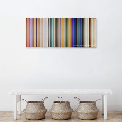 Meet the Robinsons color palette canvas above a white bench with three woven baskets