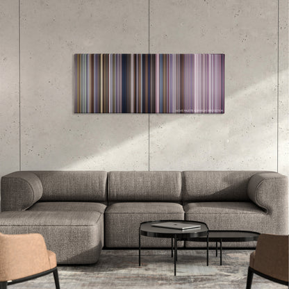 Miracle color palette canvas on a concrete wall above a gray sectional sofa