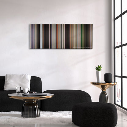 End of Watch color palette canvas above a black sofa with a gold-topped table