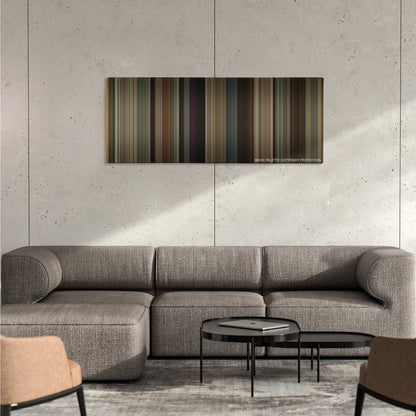 The Heat color palette canvas on a concrete wall above a gray sectional sofa