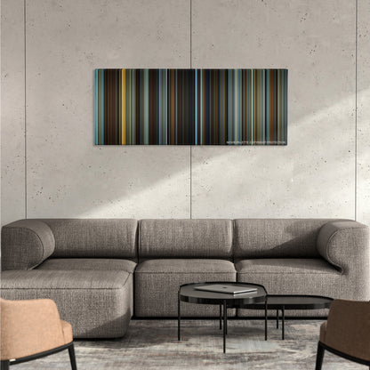 The Curious Case of Benjamin Button color palette canvas on a concrete wall above a gray sectional sofa