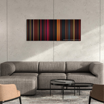 Mandy color palette canvas on a concrete wall above a gray sectional sofa