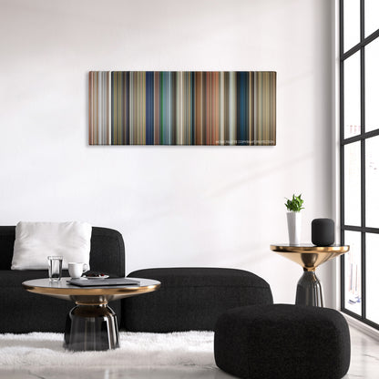 Days of Thunder color palette canvas above a black sofa with a gold-topped table