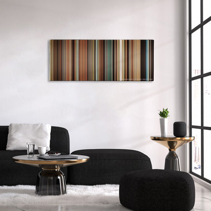 Pride & Prejudice color palette canvas above a black sofa with a gold-topped table