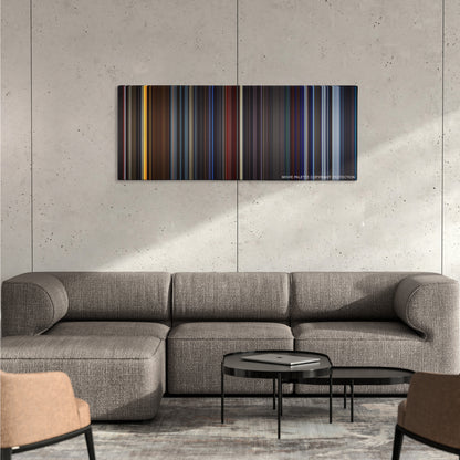 Star Trek II: The Wrath of Khan color palette canvas on a concrete wall above a gray sectional sofa