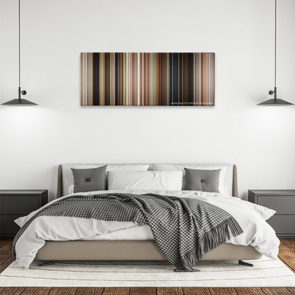 Secondhand Lions color palette canvas above a bed, between two black pendant lamps