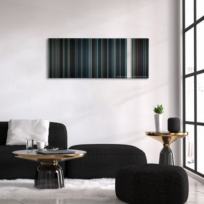 Arrival color palette canvas above a black sofa with a gold-topped table