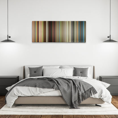 Mr. Right color palette canvas above a bed, between two black pendant lamps