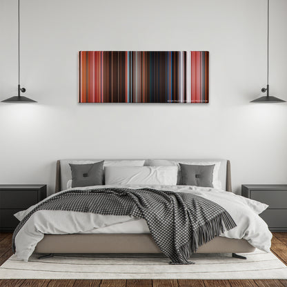 The Grand Budapest Hotel color palette canvas above a bed, between two black pendant lamps
