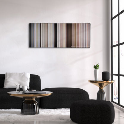 The Road Warrior color palette canvas above a black sofa with a gold-topped table