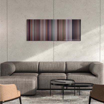 Live and Let Die color palette canvas on a concrete wall above a gray sectional sofa