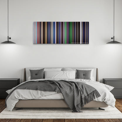 La La Land color palette canvas above a bed, between two black pendant lamps
