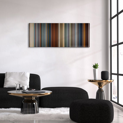 Skyfall color palette canvas above a black sofa with a gold-topped table