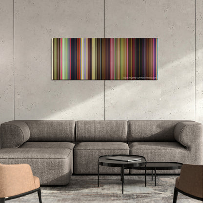 Trolls color palette canvas on a concrete wall above a gray sectional sofa