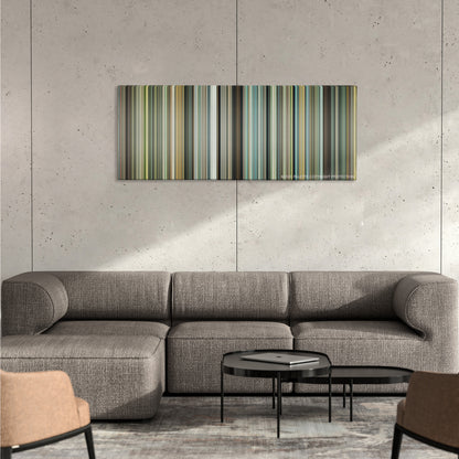 The Place Beyond the Pines color palette canvas on a concrete wall above a gray sectional sofa