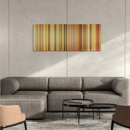 Amelie color palette canvas on a concrete wall above a gray sectional sofa