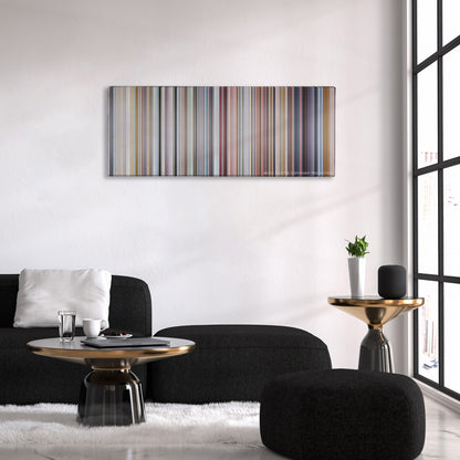 Love Actually color palette canvas above a black sofa with a gold-topped table