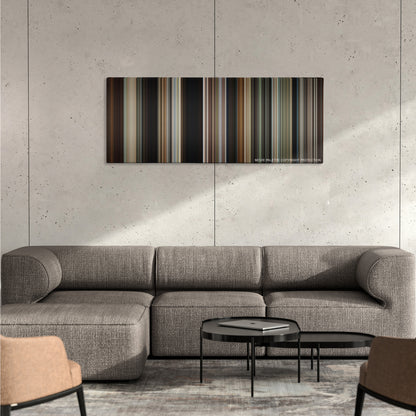 Butch Cassidy and the Sundance Kid color palette canvas on a concrete wall above a gray sectional sofa