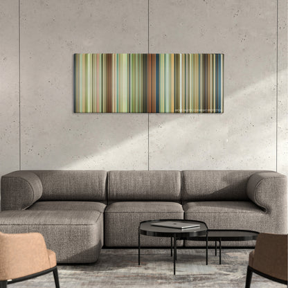 Whisper of the Heart color palette canvas on a concrete wall above a gray sectional sofa