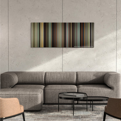 Lady Bird color palette canvas on a concrete wall above a gray sectional sofa