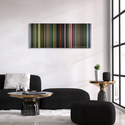 Oldboy color palette canvas above a black sofa with a gold-topped table