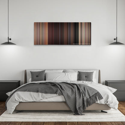 Sixteen Candles color palette canvas above a bed, between two black pendant lamps