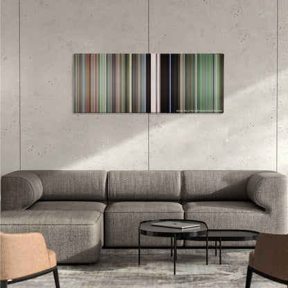 Stand by Me color palette canvas on a concrete wall above a gray sectional sofa