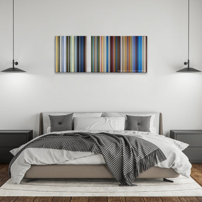 Klaus color palette canvas above a bed, between two black pendant lamps