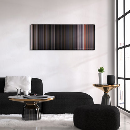 Ant-Man and the Wasp color palette canvas above a black sofa with a gold-topped table