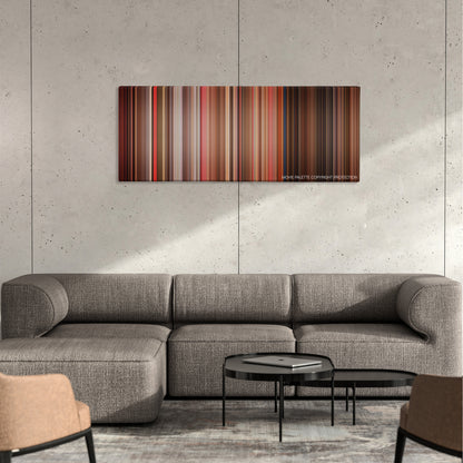 Do the Right Thing color palette canvas on a concrete wall above a gray sectional sofa