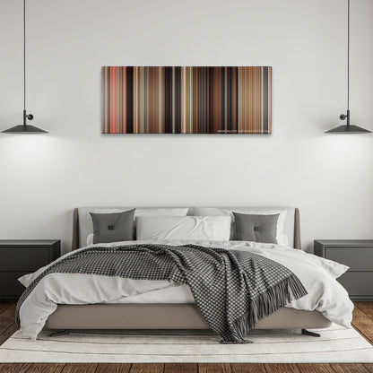 Knight and Day color palette canvas above a bed, between two black pendant lamps