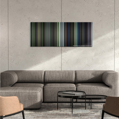 Braveheart color palette canvas on a concrete wall above a gray sectional sofa