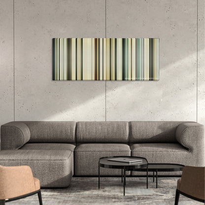 Sahara color palette canvas on a concrete wall above a gray sectional sofa