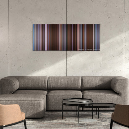 Derailed color palette canvas on a concrete wall above a gray sectional sofa