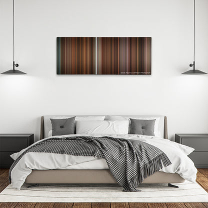 Gosford Park color palette canvas above a bed, between two black pendant lamps