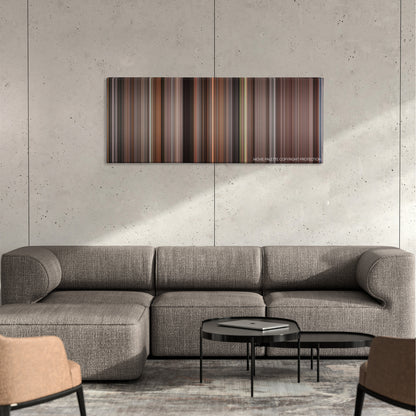 Shakespeare in Love color palette canvas on a concrete wall above a gray sectional sofa