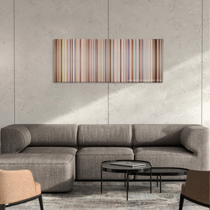 Senna color palette canvas on a concrete wall above a gray sectional sofa