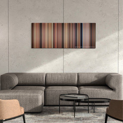 Father of the Bride color palette canvas on a concrete wall above a gray sectional sofa