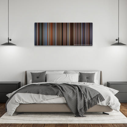 The Family Man color palette canvas above a bed, between two black pendant lamps