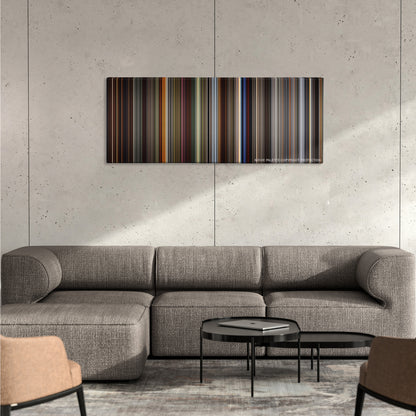 How to Train Your Dragon color palette canvas on a concrete wall above a gray sectional sofa
