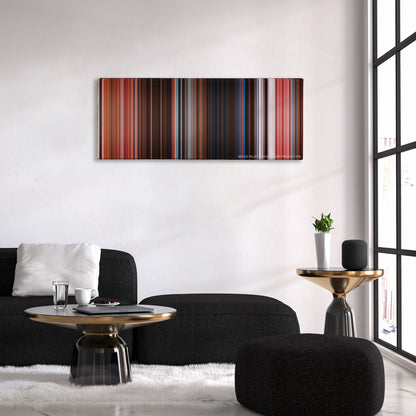 The Grand Budapest Hotel color palette canvas above a black sofa with a gold-topped table