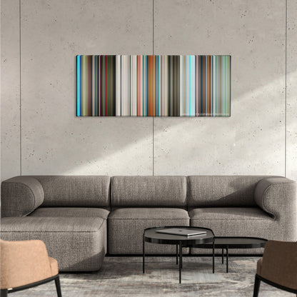 The Hitchhiker's Guide to the Galaxy color palette canvas on a concrete wall above a gray sectional sofa