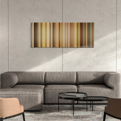 Leon: The Professional color palette canvas on a concrete wall above a gray sectional sofa