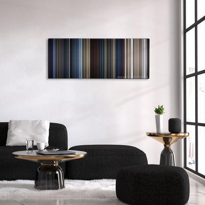 Solo: A Star Wars Story color palette canvas above a black sofa with a gold-topped table